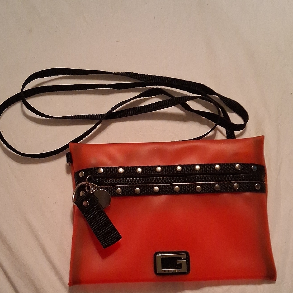 Guess Transparent Silicone Feel Gorgeous Red Wristlet with Studded Detail